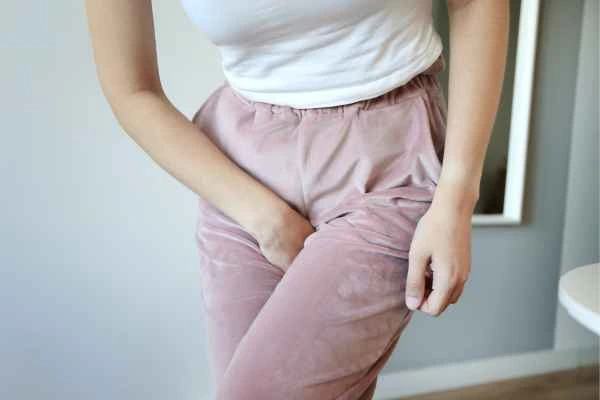 woman struggling with urine incontinence Coventry